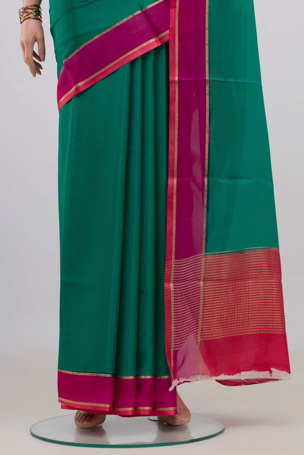 Pleats and pallu of Green Mysore Crepe Saree with Plain Body and Plain Border. 