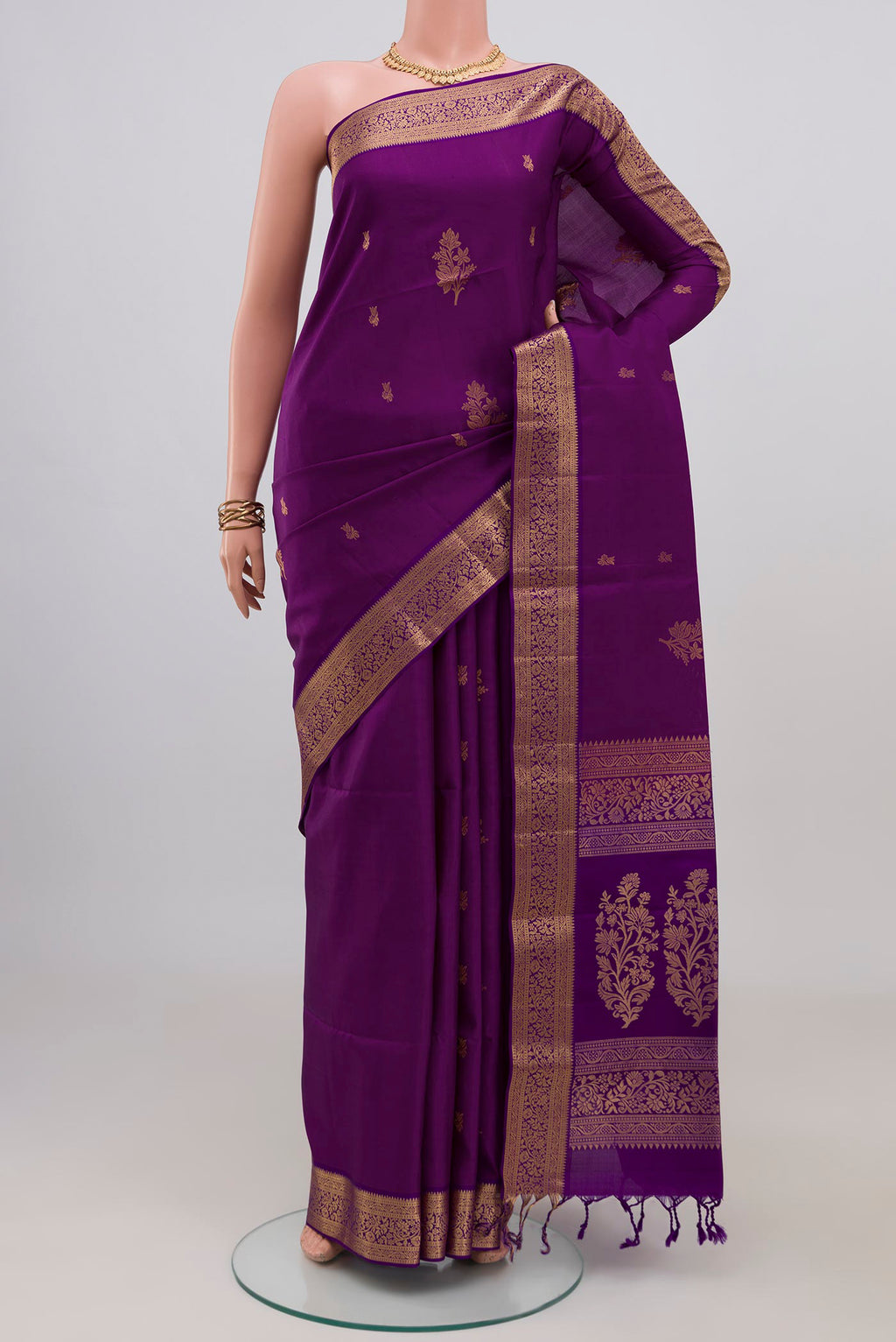 Violet Soft Silk Saree with Zari Butta on the body and Zari Border.  displayed on a mannequin