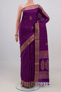 Violet Soft Silk Saree with Zari Butta on the body and Zari Border.  displayed on a mannequin