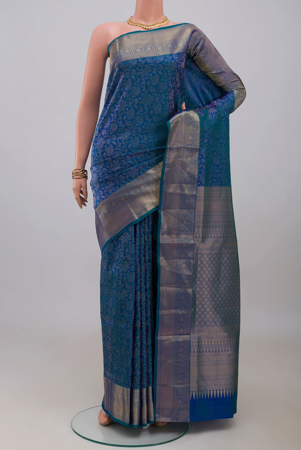 Blue Soft Silk Saree with Zari Brocade on the body and Zari Border.  displayed on a mannequin