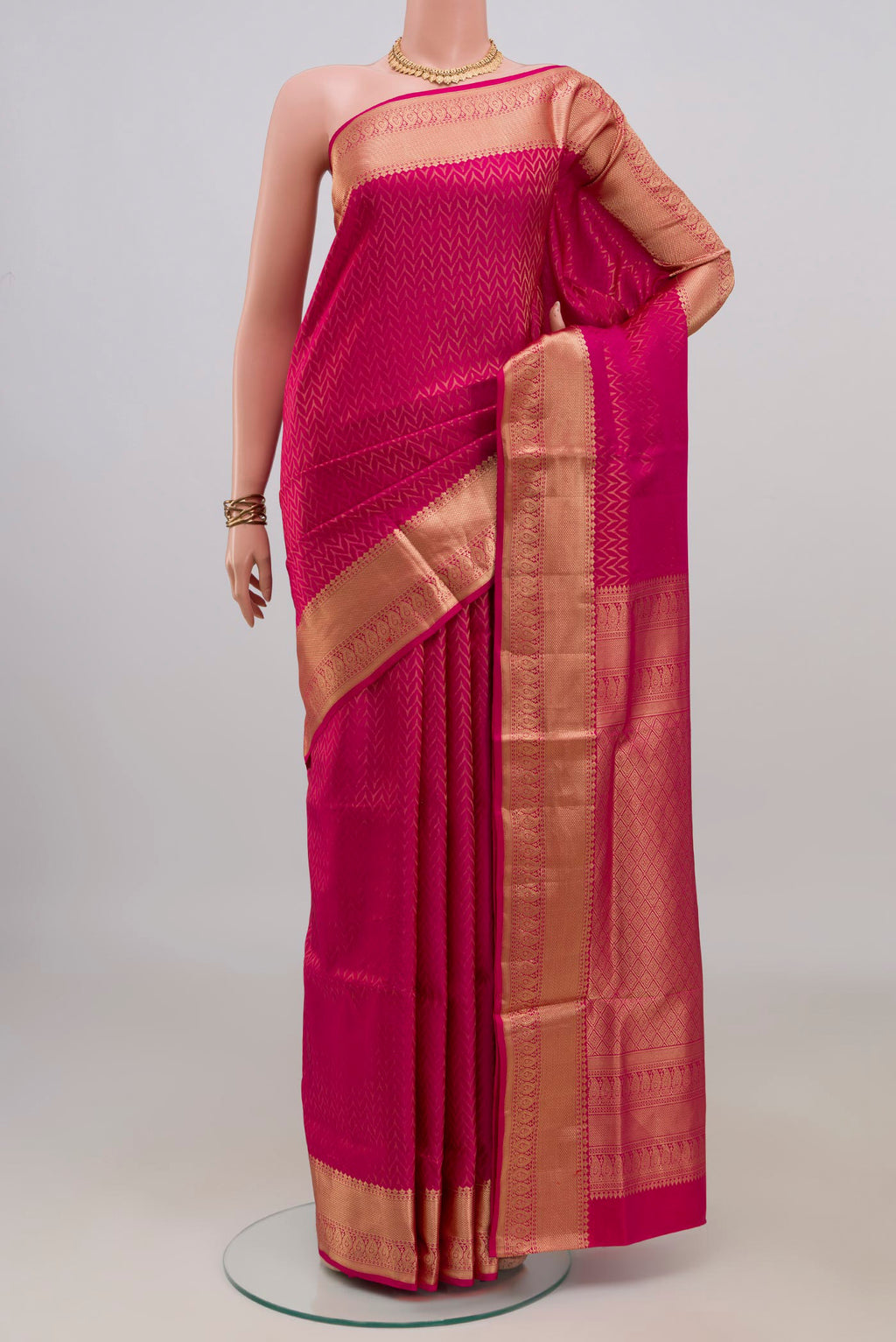 Pure Silk Pink Soft Saree with Zari Brocade on the body and Zari Border.  displayed on a mannequin