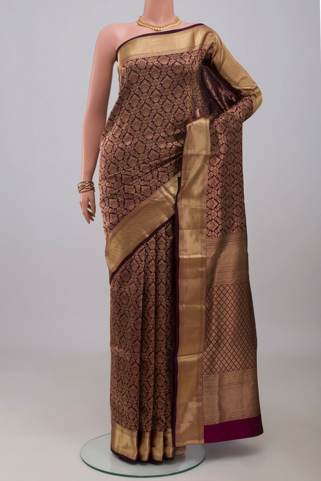 Purple Soft Silk Saree with Zari Brocade on the body and Zari Border.  displayed on a mannequin