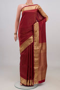 Maroon Soft Silk Saree with Zari Brocade on the body and Zari Border.  displayed on a mannequin