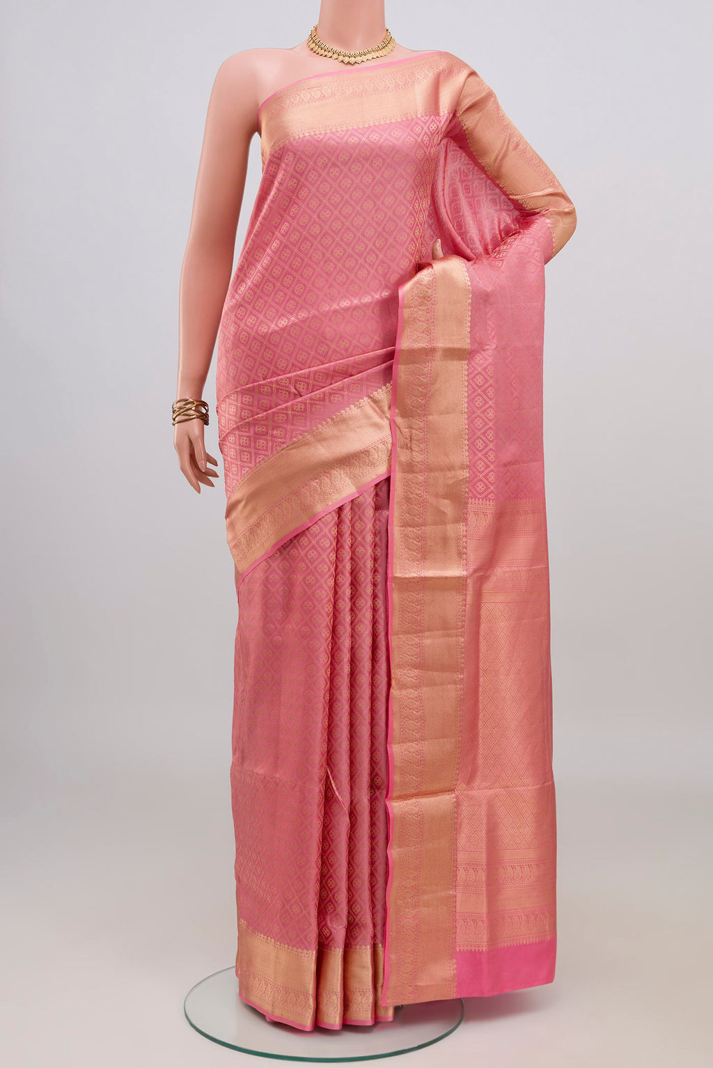 Rose pink Soft Silk Saree with Zari Brocade on the body and Zari Border.  displayed on a mannequin