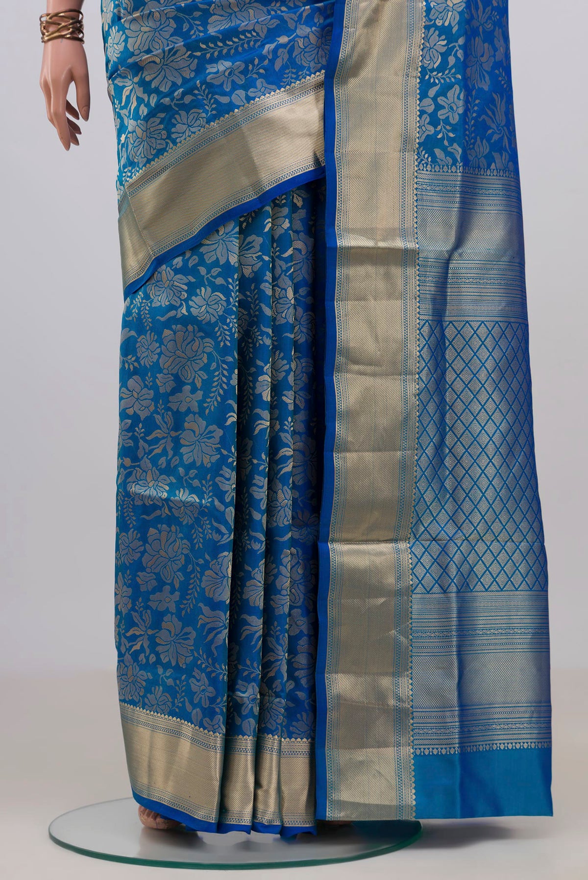 Pleats and pallu of Pure Silk Blue Soft Saree with Zari Brocade on the body and Zari Border. 