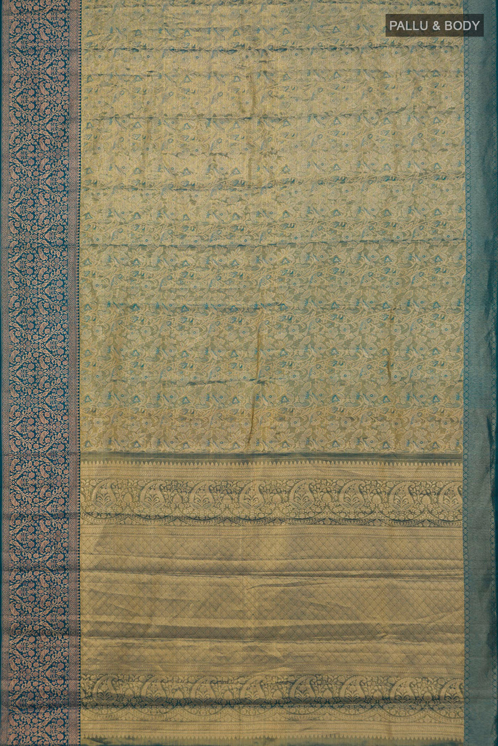Flat view of Gold with Blue Color Kanchipuram Tissue Saree with Zari Brocade on the body and Fancy Border. 