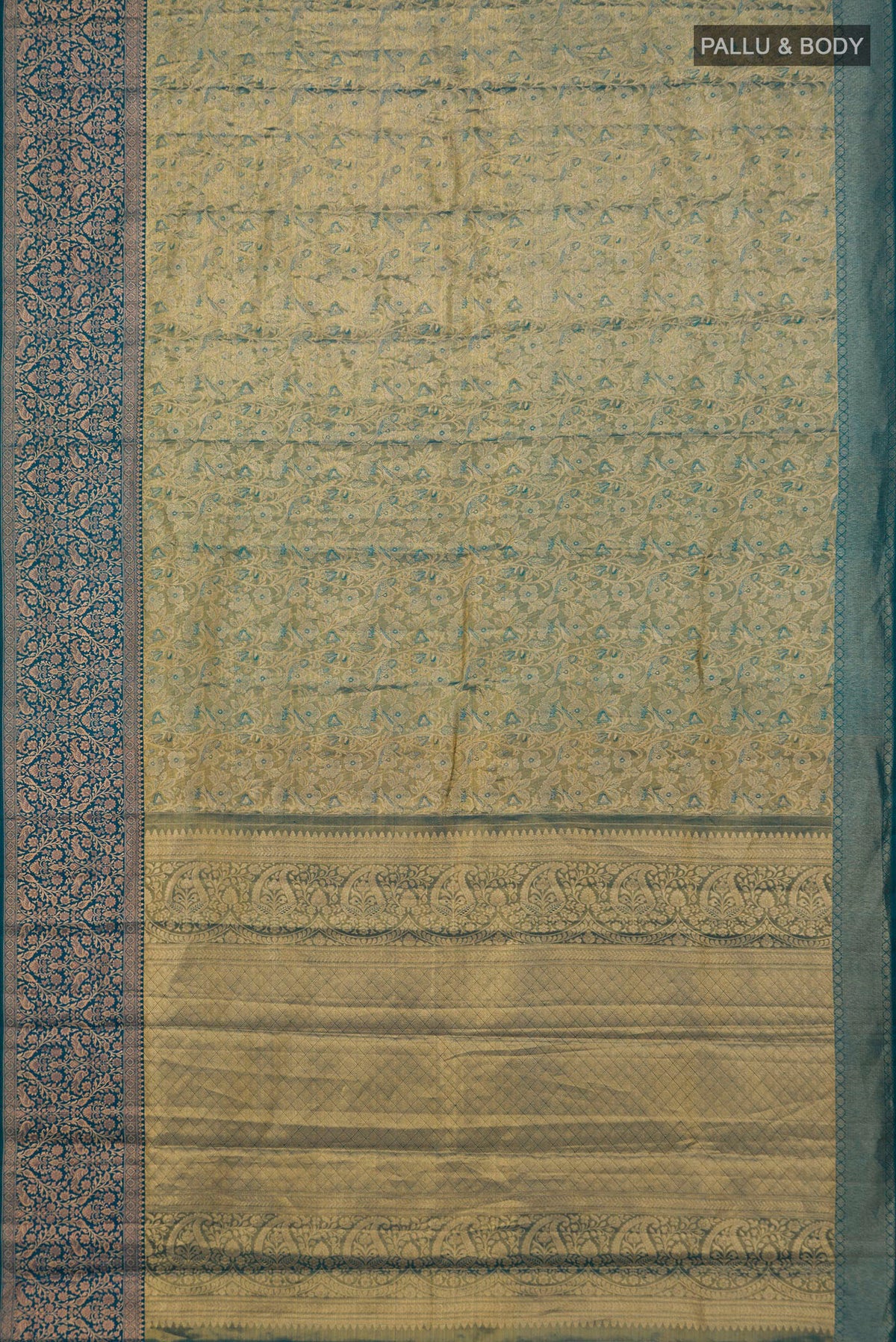 Flat view of Gold with Blue Color Kanchipuram Tissue Saree with Zari Brocade on the body and Fancy Border. 