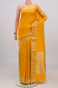 Yellow Banarasi Katan Silk Saree with Zari Butta on the body and Zari Border.  displayed on a mannequin