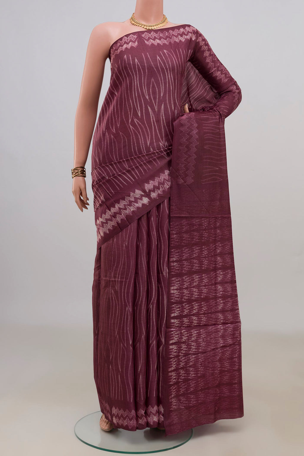 Pure Silk Purple Tussar Saree with Fancy on the body and Without Border.  displayed on a mannequin