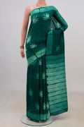 Pure Silk Green Tussar Saree with Fancy on the body and Without Border.  displayed on a mannequin
