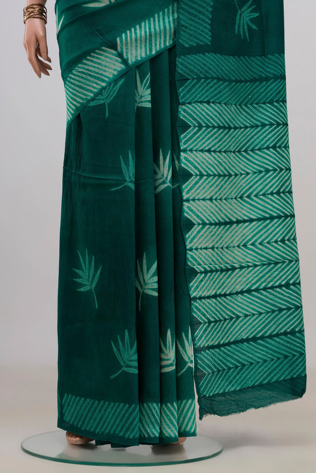Pleats and pallu of Pure Silk Green Tussar Saree with Fancy on the body and Without Border. 