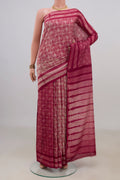 Pure Silk Maroon Tussar Saree with Fancy on the body and Without Border.  displayed on a mannequin