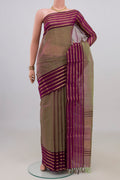 Green Dual Tone Silk Cotton Saree with Zari Butta on the body and Zari Border.  displayed on a mannequin