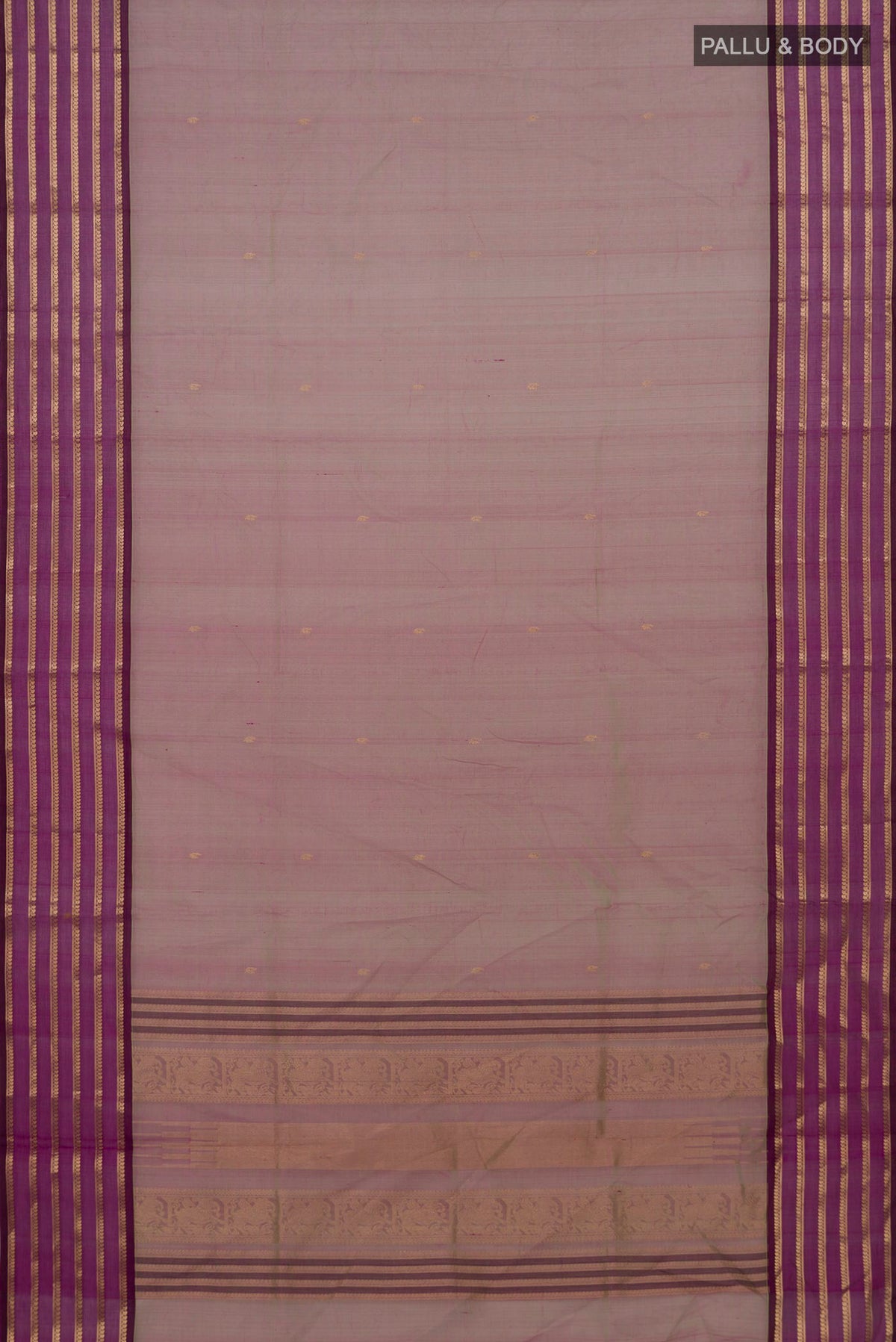Flat view of Green Dual Tone Silk Cotton Saree with Zari Butta on the body and Zari Border. 