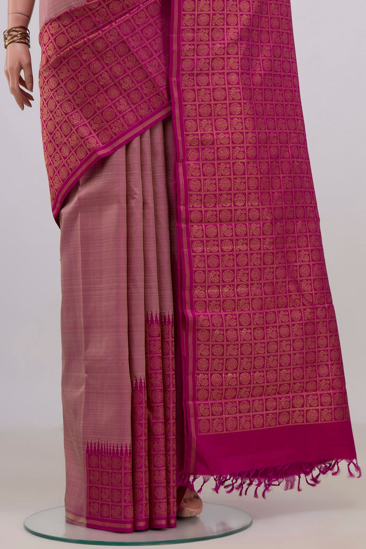 Pleats and pallu of Pure Silk Pure Zari Multi Color Kanjivaram Saree with Fancy on the body and Rising Temple Border. 