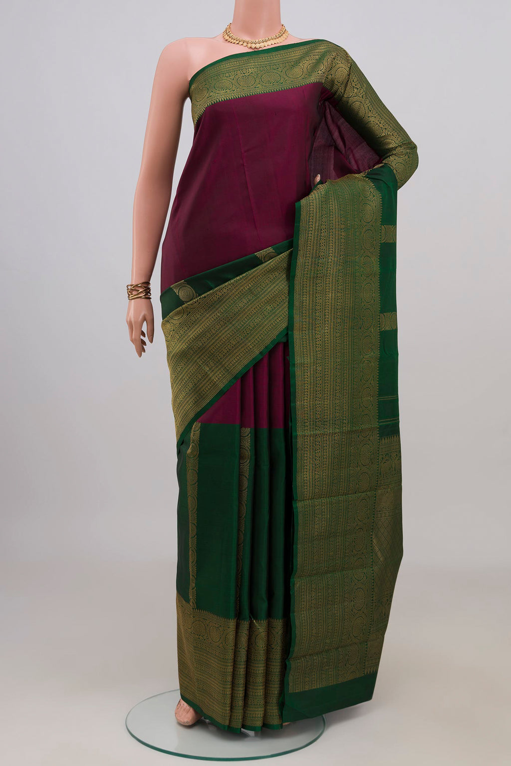 Pure Silk Pure Zari Multi Color Kanjivaram Saree with Half And Half on the body and Zari Border.  displayed on a mannequin