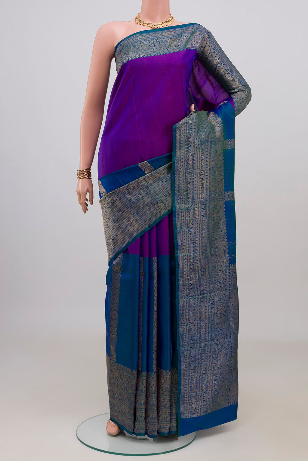 Pure Silk Pure Zari Multi Color Kanjivaram Saree with Half And Half on the body and Zari Border.  displayed on a mannequin