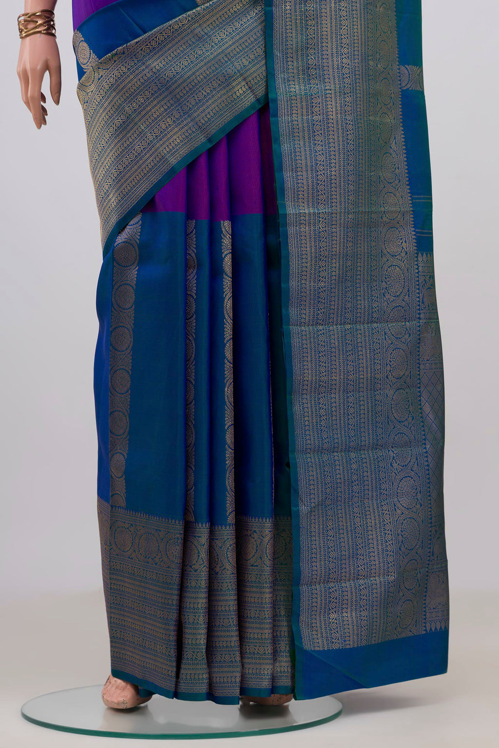 Pleats and pallu of Pure Silk Pure Zari Multi Color Kanjivaram Saree with Half And Half on the body and Zari Border. 