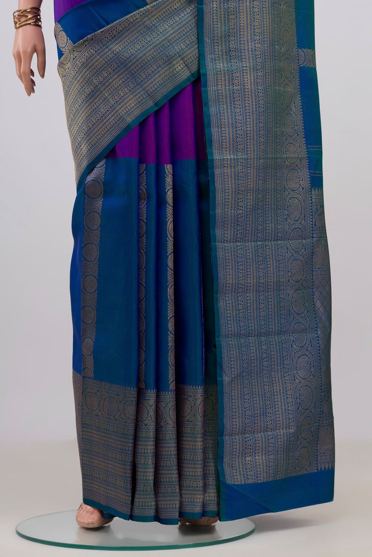 Pleats and pallu of Pure Silk Pure Zari Multi Color Kanjivaram Saree with Half And Half on the body and Zari Border. 