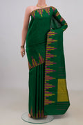Pure Silk Green Kanjivaram Saree with Plain Body and Temple Border.  displayed on a mannequin