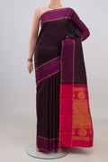 Pure Silk Black Kanchipuram Saree with Checked design on the body and Thin Zari Line.  displayed on a mannequin