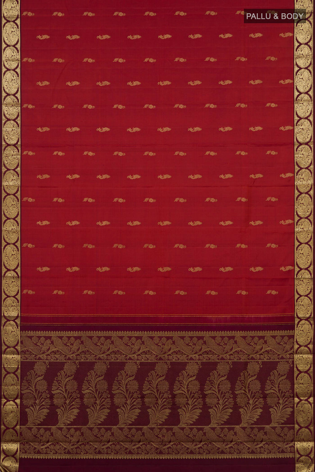 Flat view of Pure Silk Rust Kanchipuram Saree with Zari Butta on the body and Zari Border. 