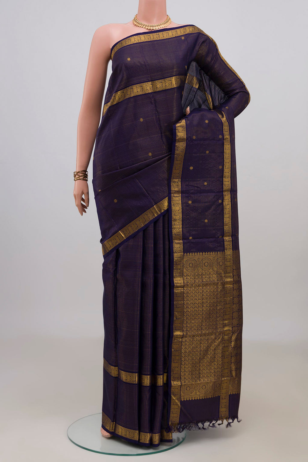 Pure Silk Navy Blue Kanchipuram Saree with Stripes on the body and Fancy Border.  displayed on a mannequin
