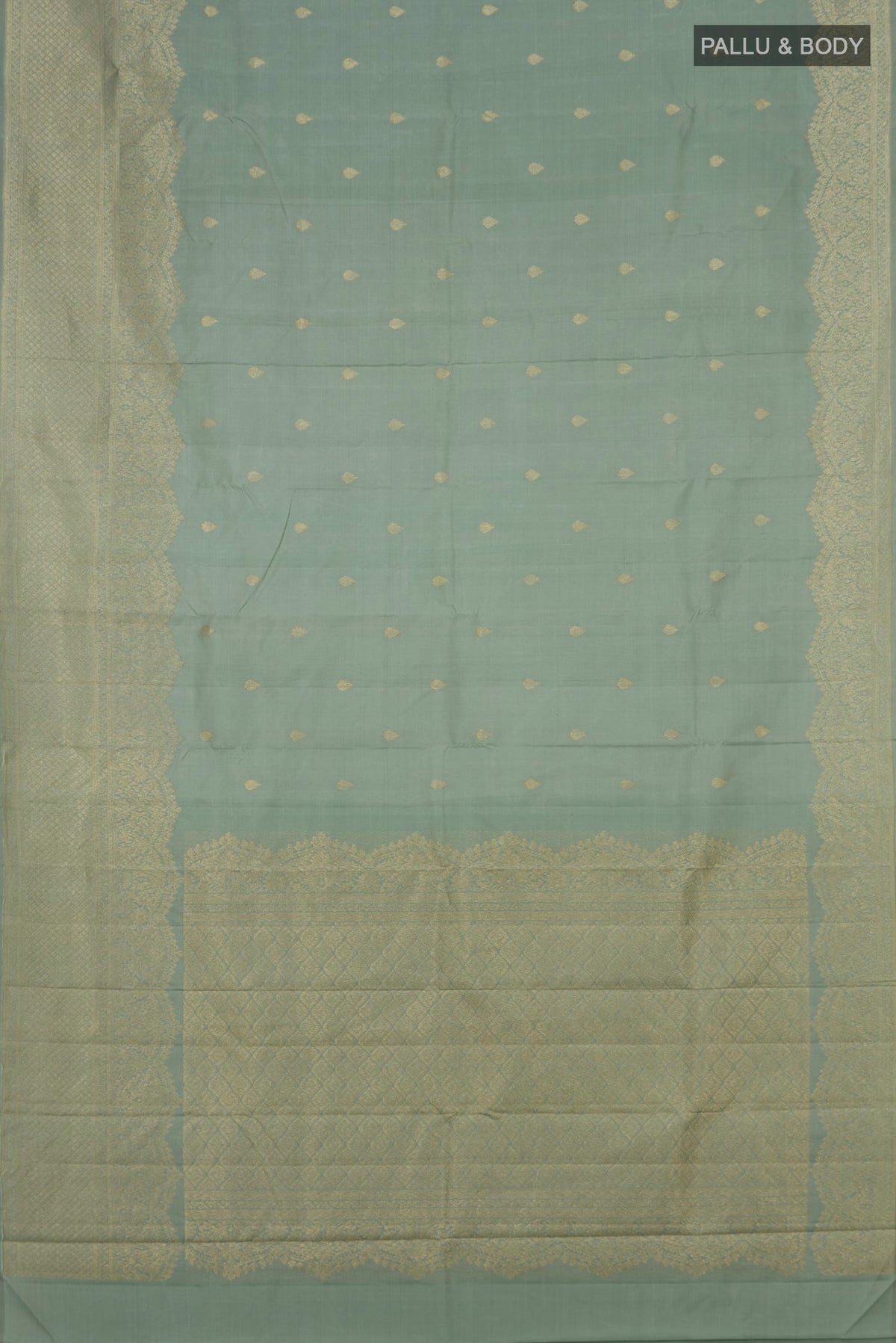 Flat view of Pure Silk Sage Green Kanjivaram Saree with Zari Butta on the body and Fancy Border. 
