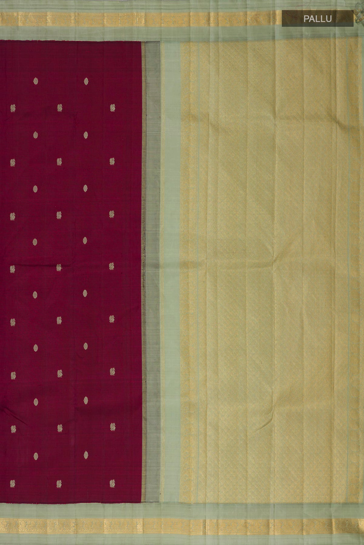 Close up image of the pallu of Pure Silk Maroon Kanjivaram Saree with Thread Butta on the body and Zari Border. 