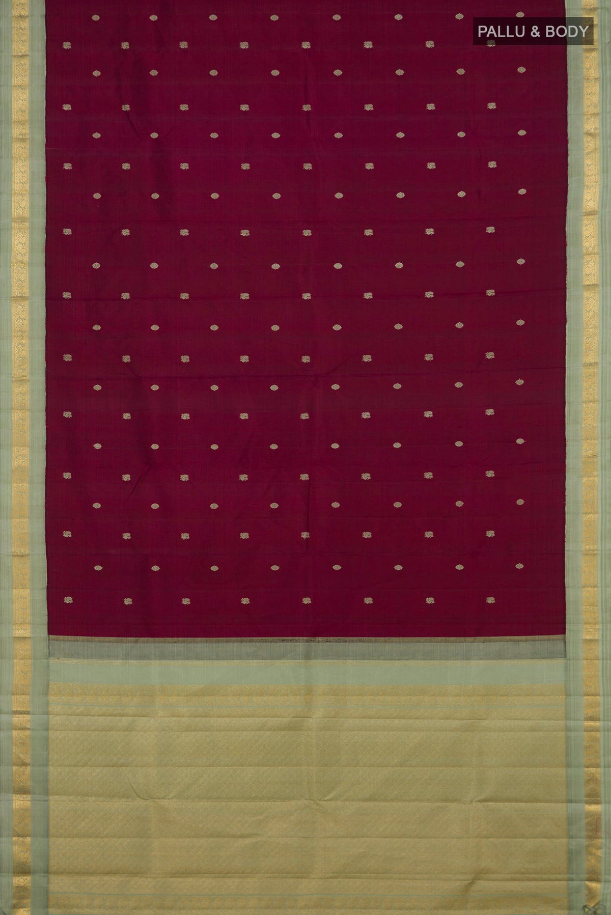 Flat view of Pure Silk Maroon Kanjivaram Saree with Thread Butta on the body and Zari Border. 