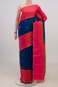 Pure Silk Pure Zari Peacock Blue Kanjivaram Saree with Zari Butta on the body and Thin Zari Line.  displayed on a mannequin