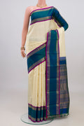 Pure Silk Pure Zari Cream Kanjivaram Saree with Checked design on the body and Zari Border.  displayed on a mannequin