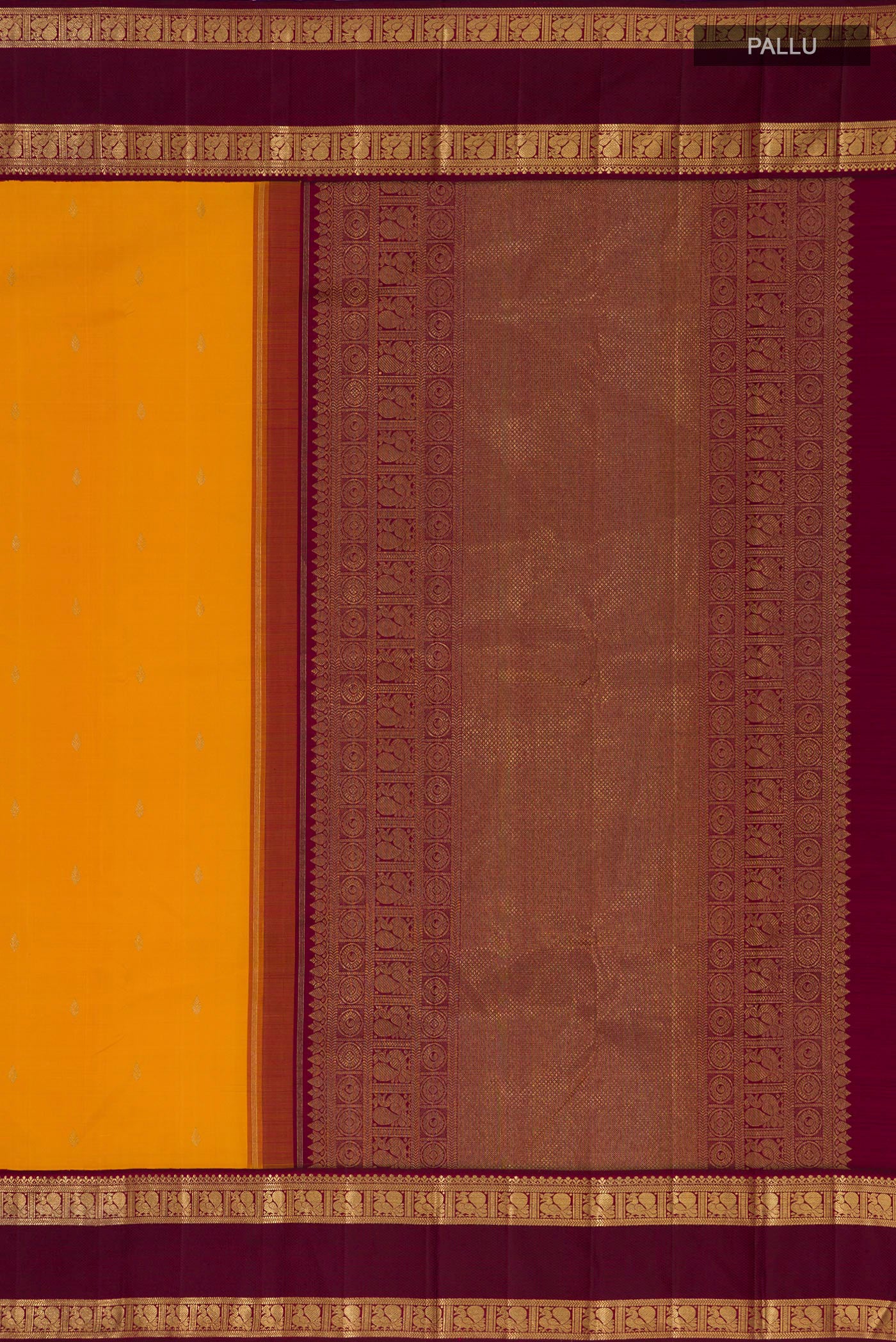 Close up image of the pallu of Pure Silk Pure Zari Yellow Kanjivaram Saree with Zari Butta on the body and Zari Border. 