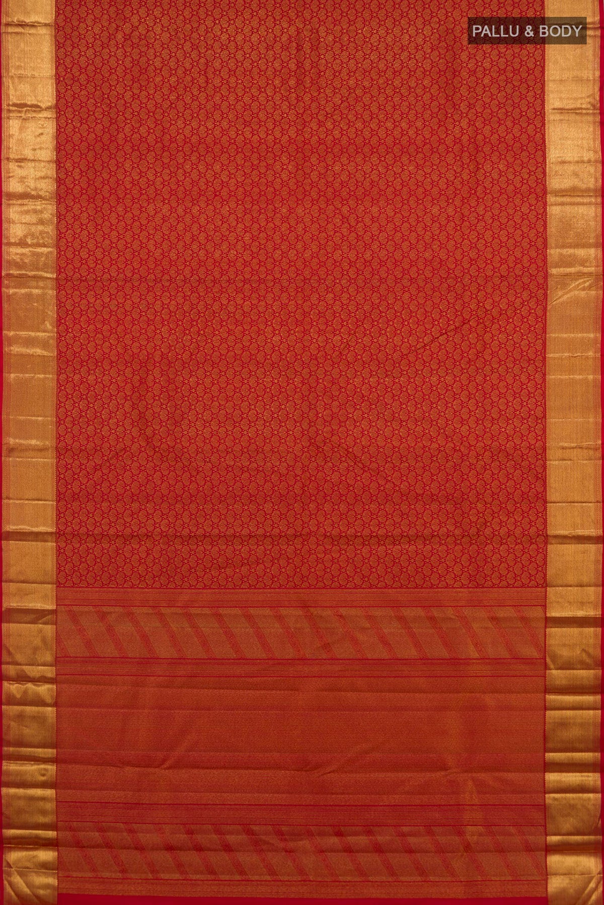 Flat view of Pure Silk Red Kanchipuram Saree with Zari Brocade on the body and Zari Border. 