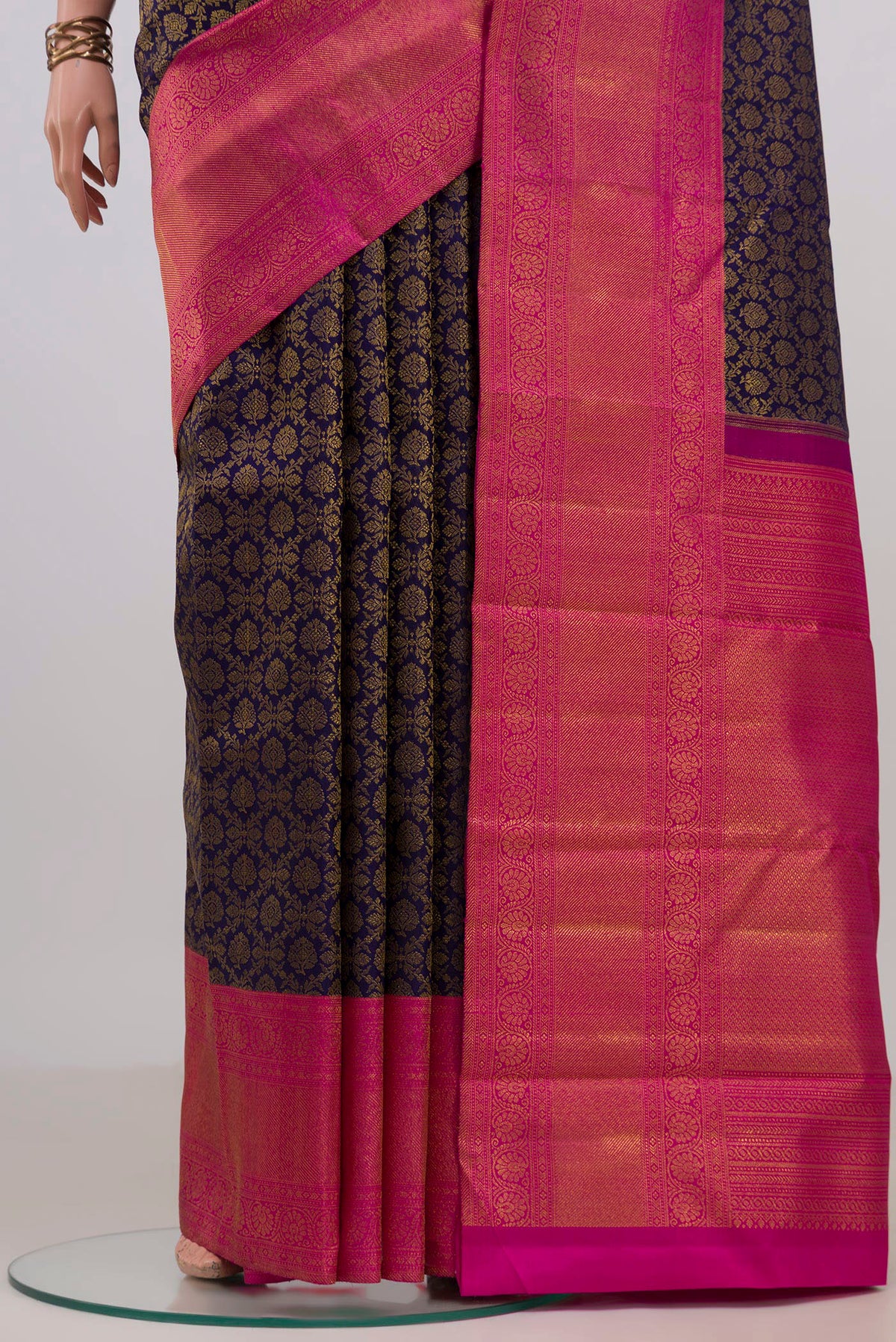 Pleats and pallu of Pure Silk Navy Blue Kanjivaram Saree with Zari Brocade on the body and Zari Border. 