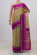 Pure Silk Pure Zari Beige Kanjivaram Saree with Stripes on the body and Zari Border.  displayed on a mannequin