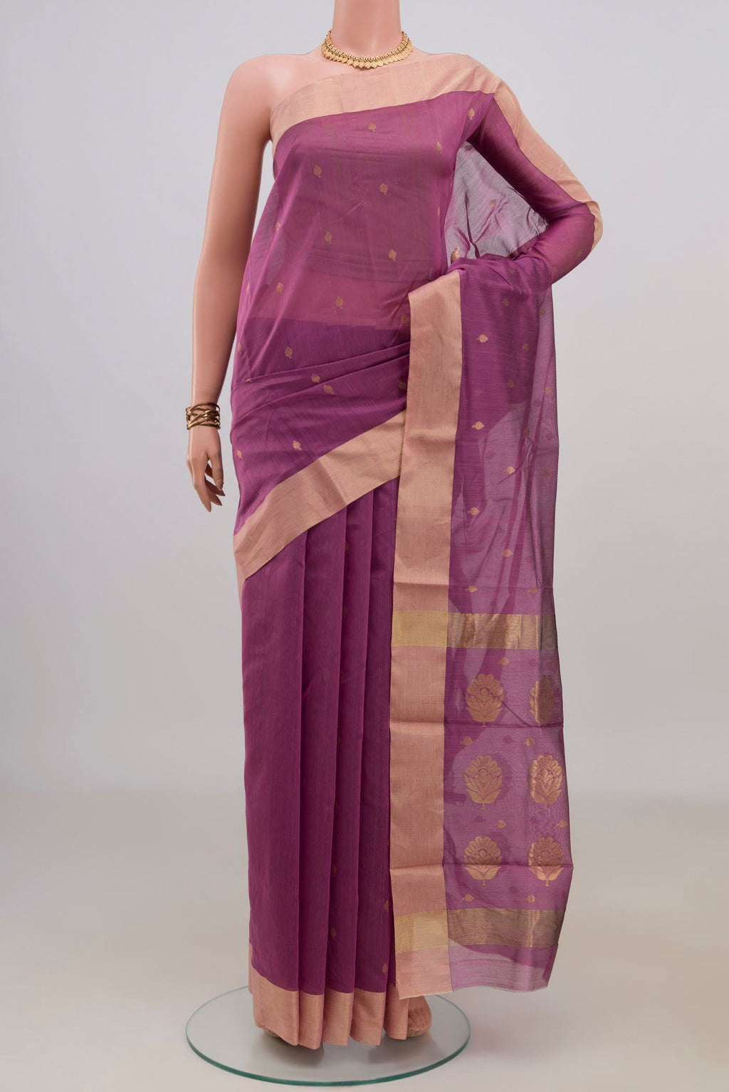 Mauve Chanderi Cotton Saree with Zari Butta on the body and Zari Border.  displayed on a mannequin