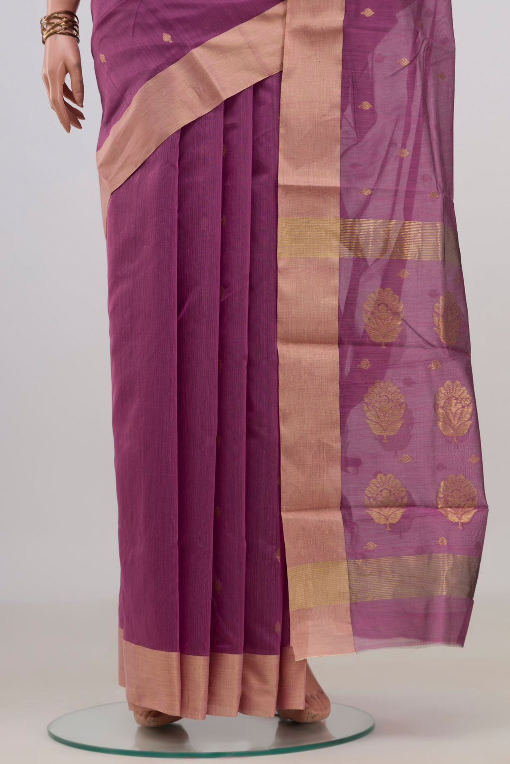 Pleats and pallu of Mauve Chanderi Cotton Saree with Zari Butta on the body and Zari Border. 