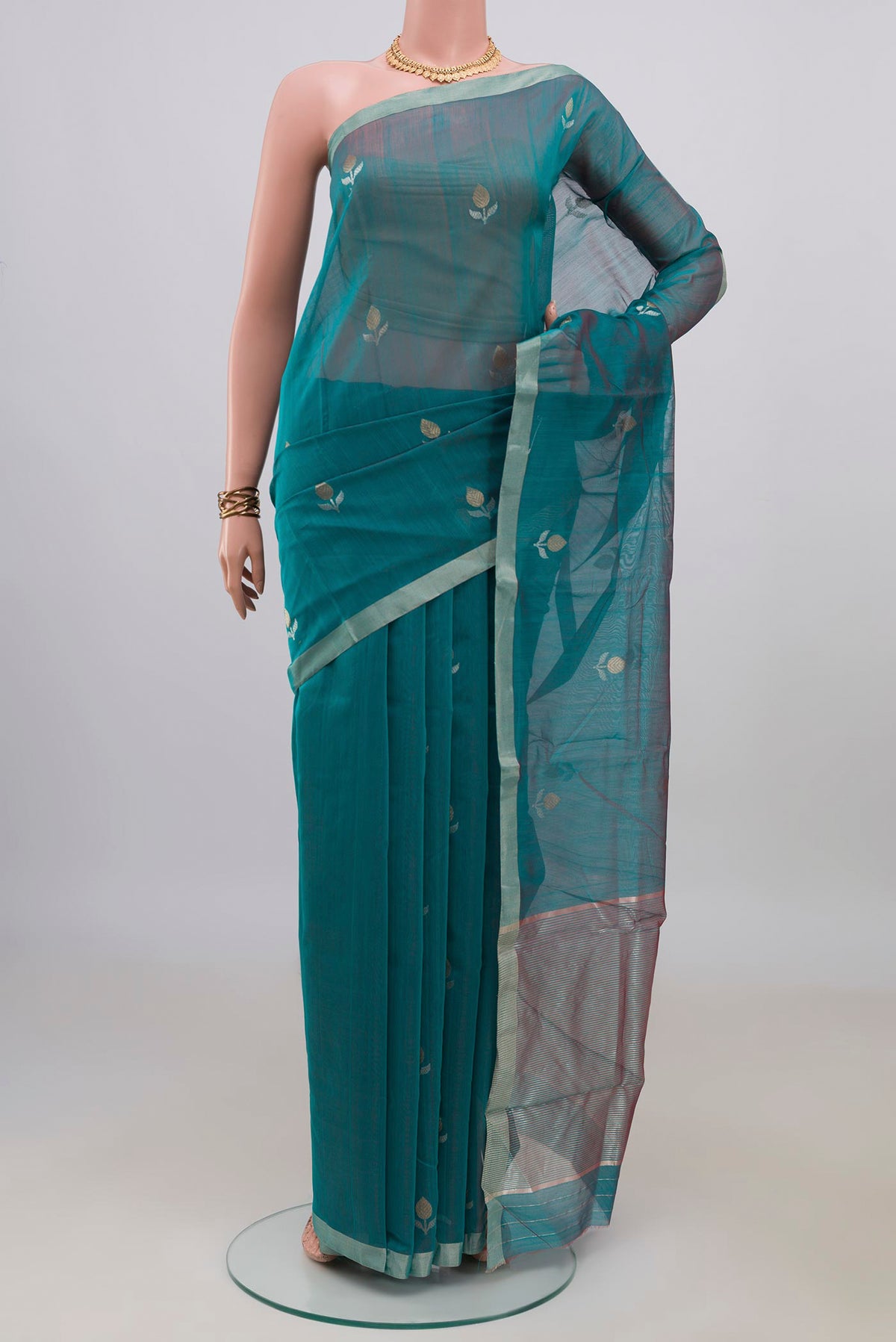 Blue Chanderi Cotton Saree with Zari Butta on the body and Zari Border.  displayed on a mannequin