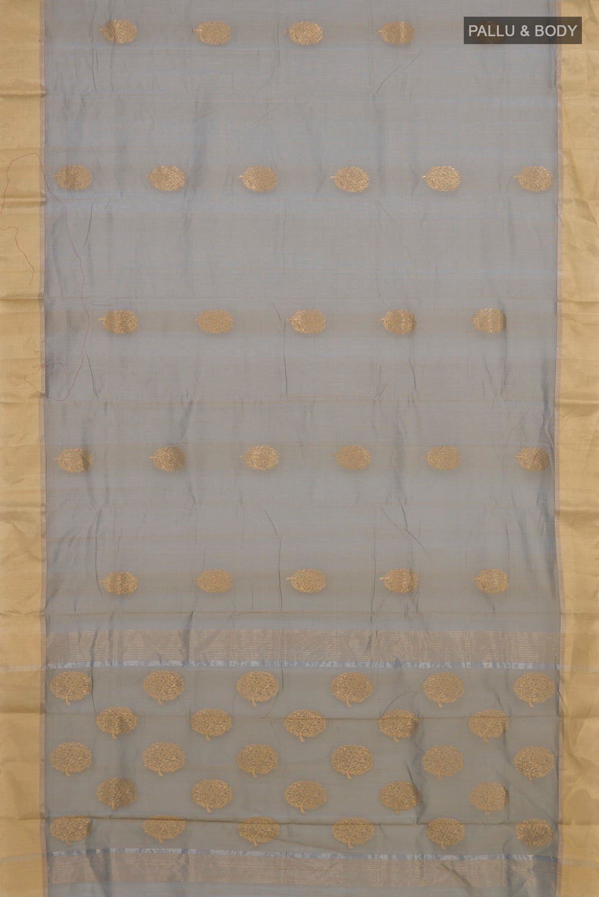 Flat view of Green Chanderi Cotton Saree with Zari Butta on the body and Zari Border. 