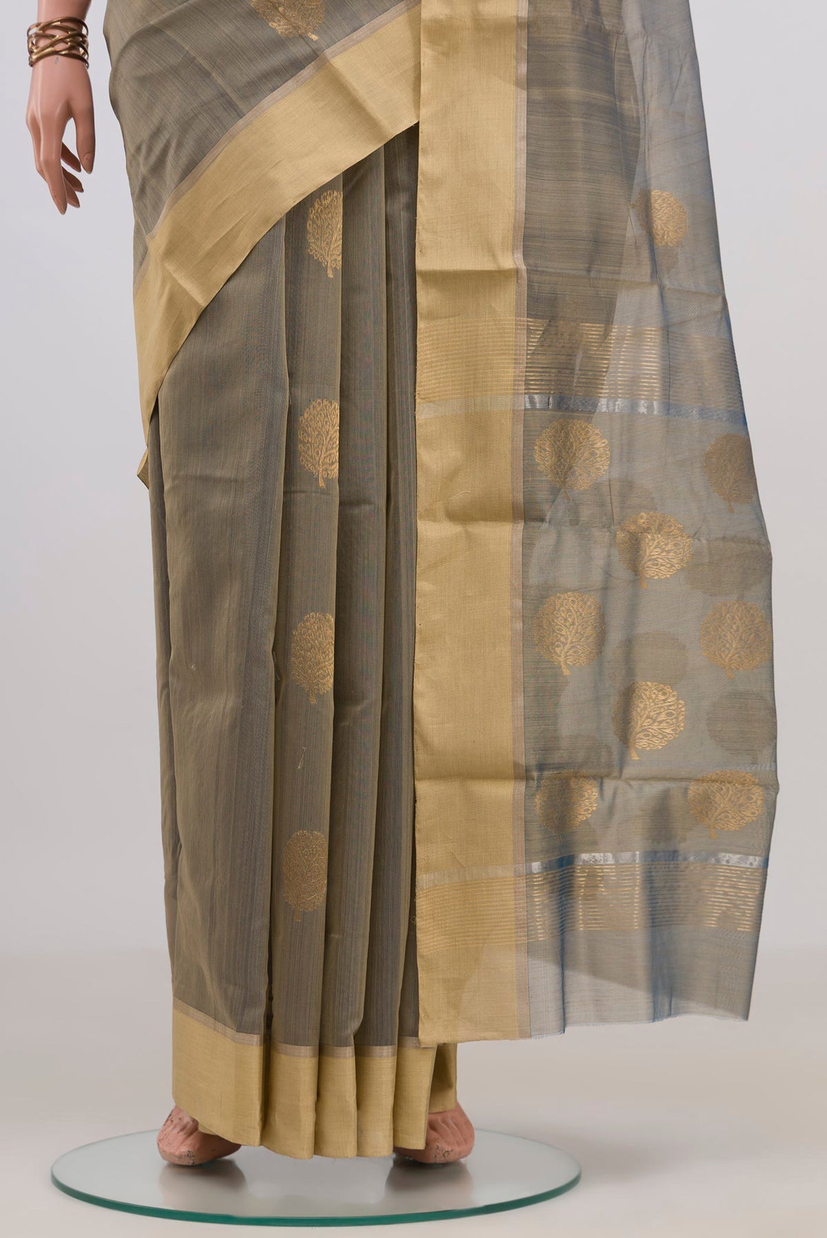 Pleats and pallu of Green Chanderi Cotton Saree with Zari Butta on the body and Zari Border. 