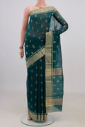 Green Chanderi Cotton Saree with Zari Butta on the body and Zari Border.  displayed on a mannequin