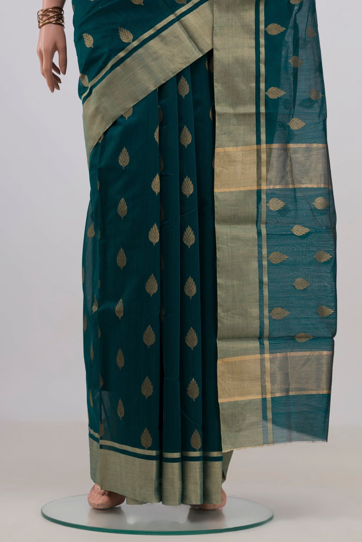 Pleats and pallu of Green Chanderi Cotton Saree with Zari Butta on the body and Zari Border. 