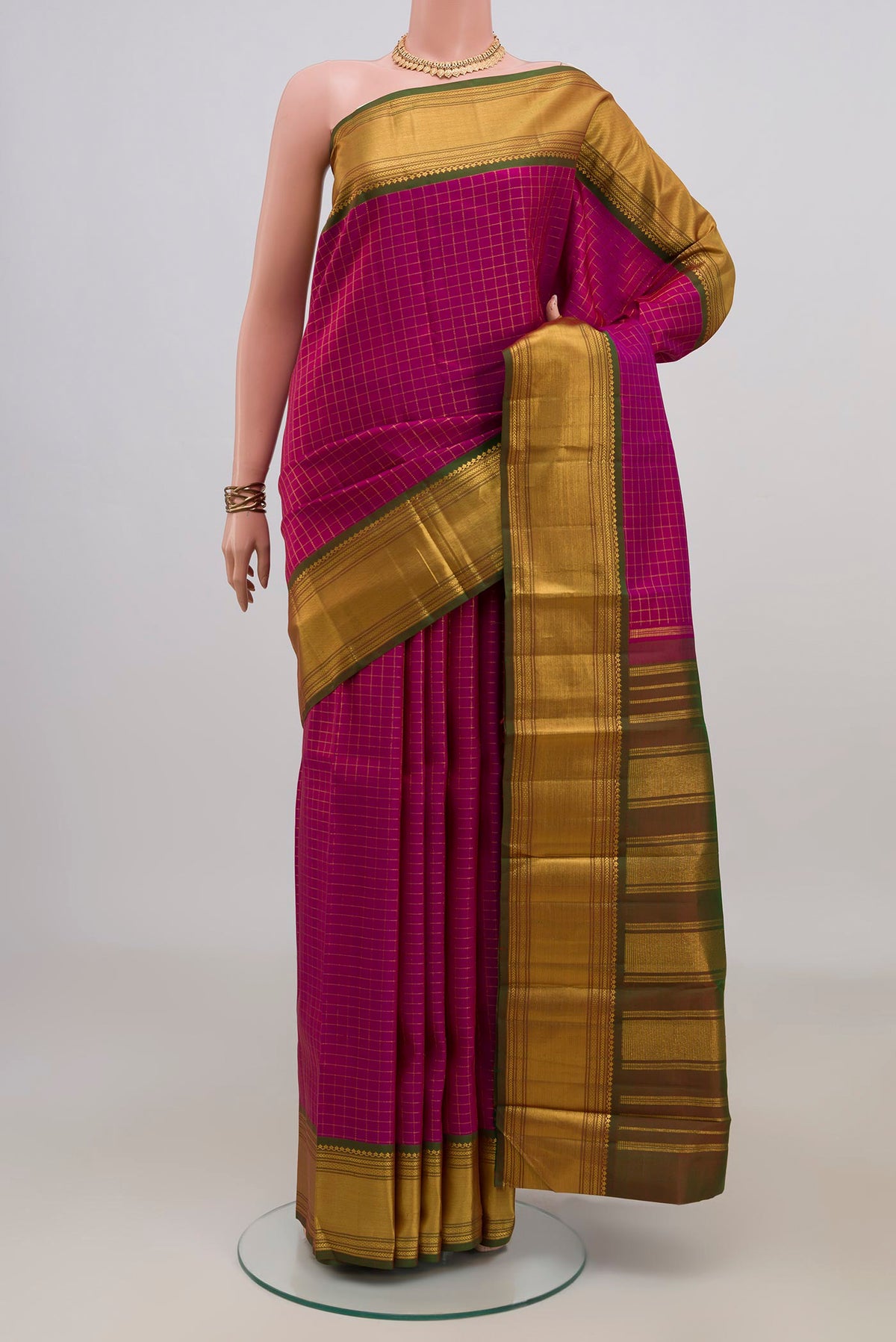 Pure Silk Dark Pink Kanchipuram Saree with Checked design on the body and Zari Border.  displayed on a mannequin