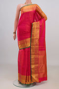 Pure Silk Pink Dual Tone Kanjivaram Saree with Checked design on the body and Zari Border.  displayed on a mannequin