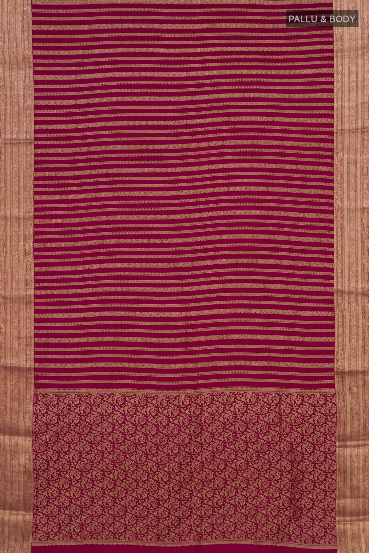 Flat view of Maroon Mysore Crepe Saree with Stripes on the body and Zari Border. 