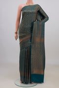 Teal Mysore Crepe Saree with Zari Brocade on the body and Zari Border.  displayed on a mannequin