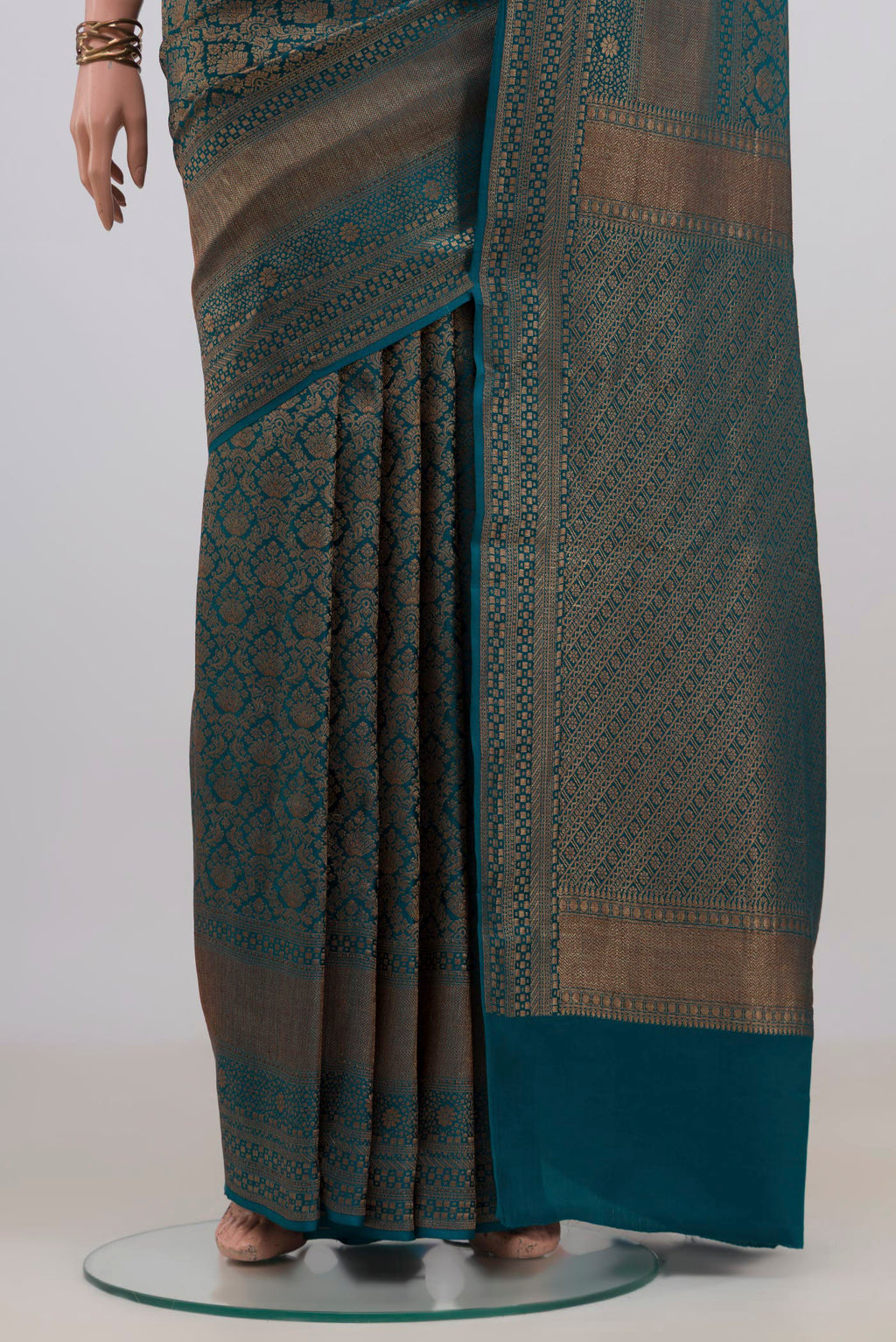 Pleats and pallu of Teal Mysore Crepe Saree with Zari Brocade on the body and Zari Border. 