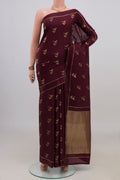 Coffee Brown Mysore Crepe Saree with Zari Butta on the body and Thin Zari Line.  displayed on a mannequin