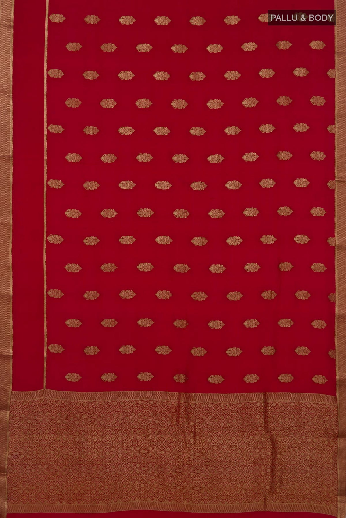 Flat view of Red Mysore Crepe Saree with Zari Butta on the body and Zari Border. 